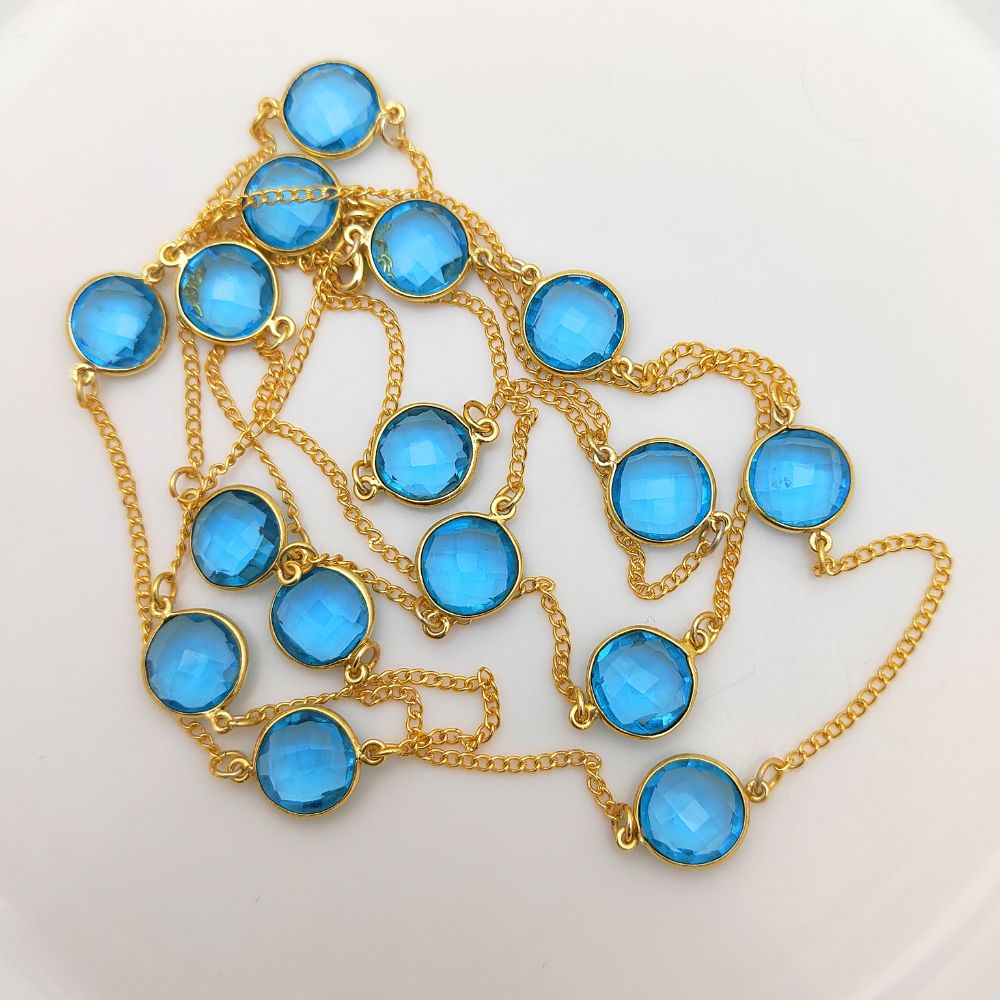 Gold Chain Necklace Featuring Faceted Blue Topaz