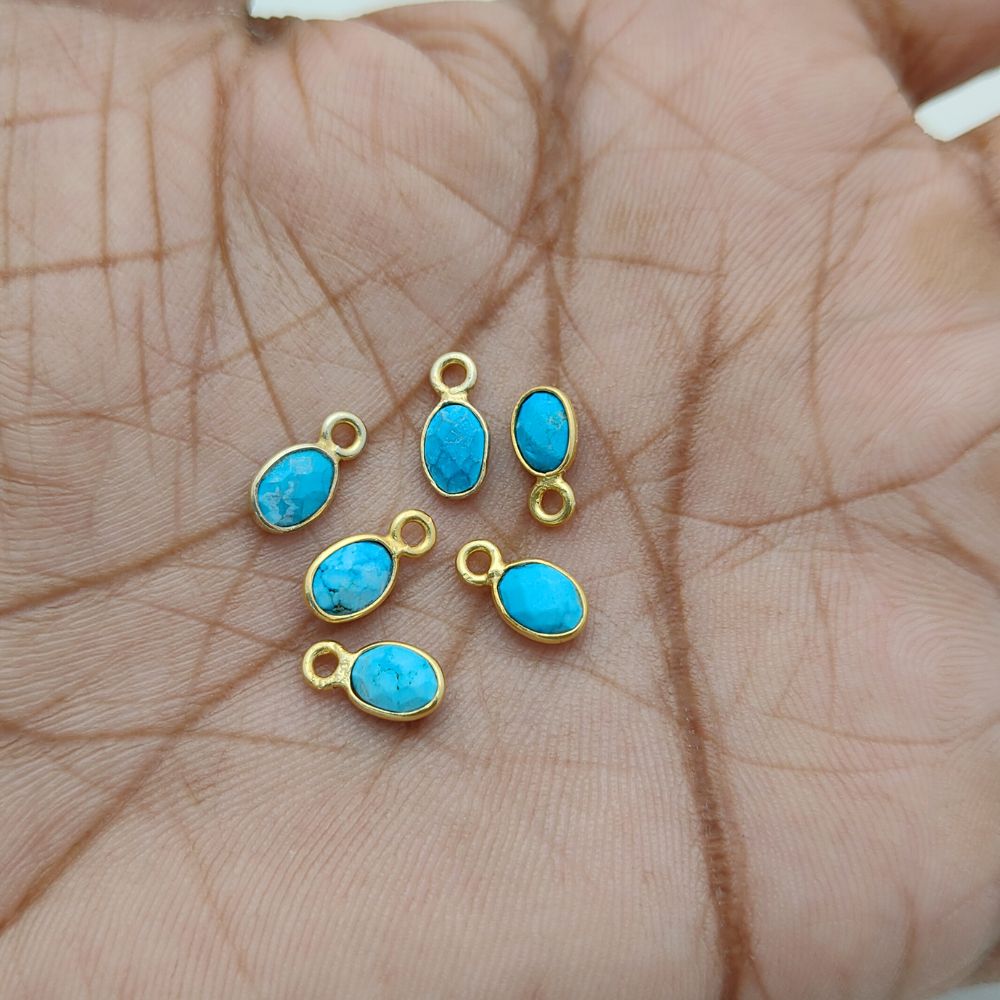 Small oval turquoise gemstone pendant with bohemian style