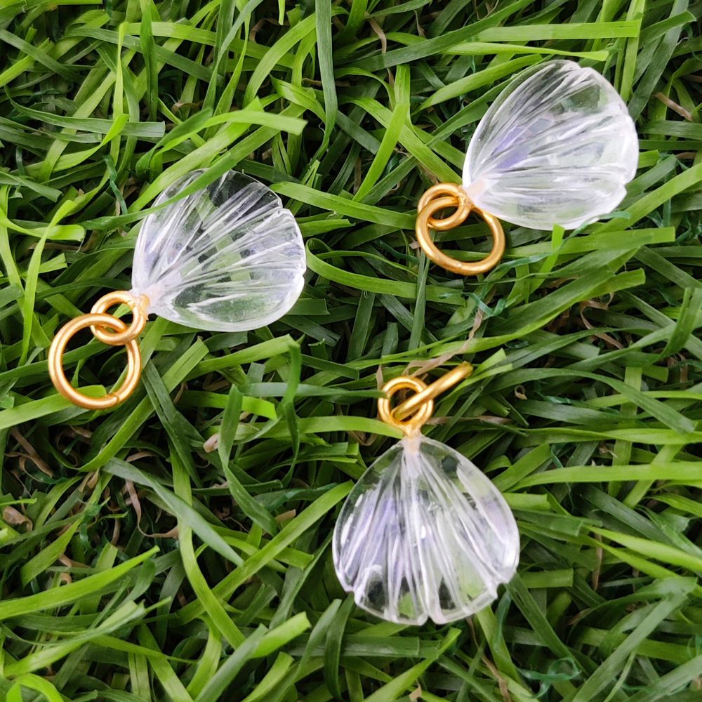 12mm heart-shaped pendant necklace made of gold-plated silver, showcasing a crystal clear carved gemstone