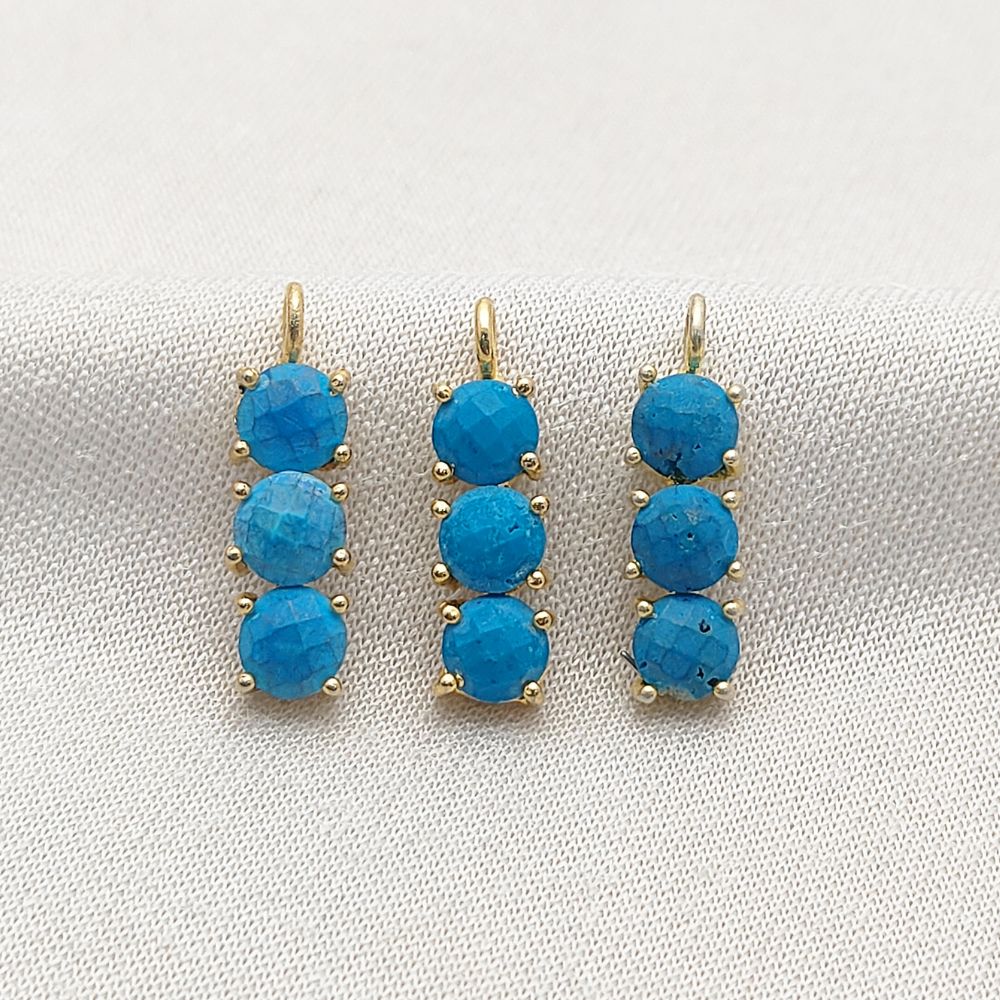 Blue gemstone necklace with three turquoise stones