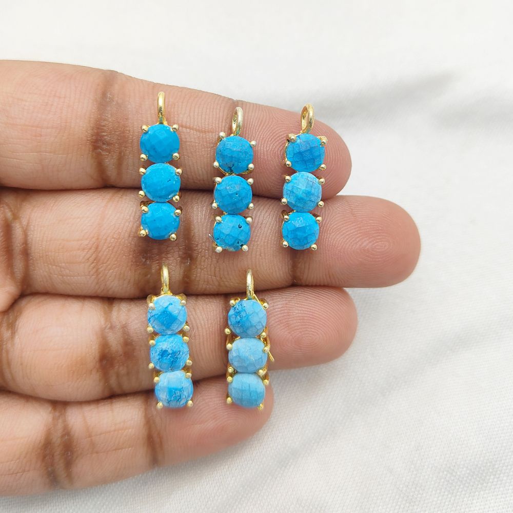 Elegant turquoise pendant in gold plated sterling silver