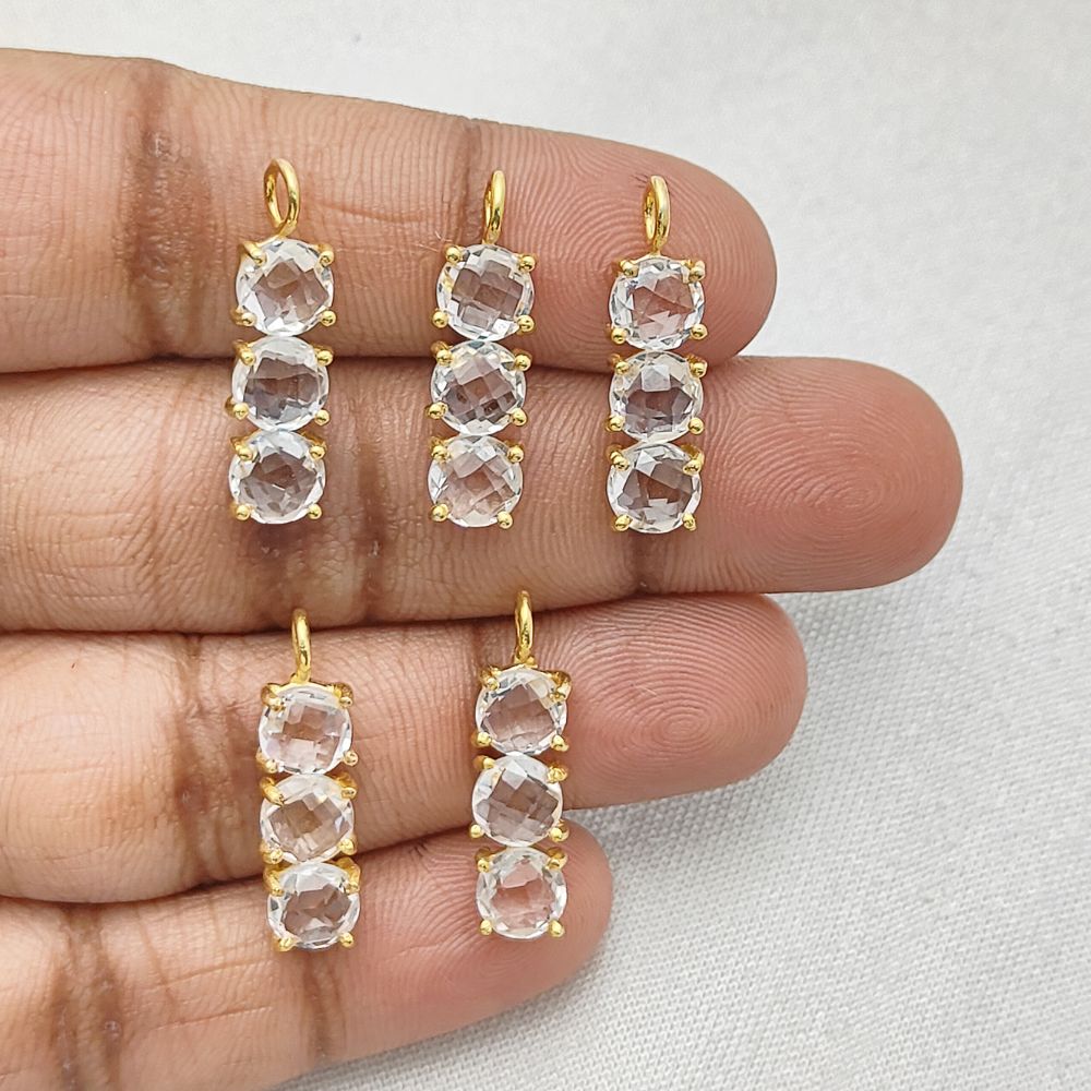 Elegant clear quartz pendant with faceted round gemstones