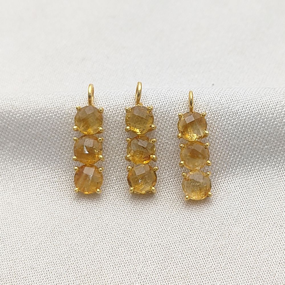 Elegant yellow gemstone necklace with three-stone design