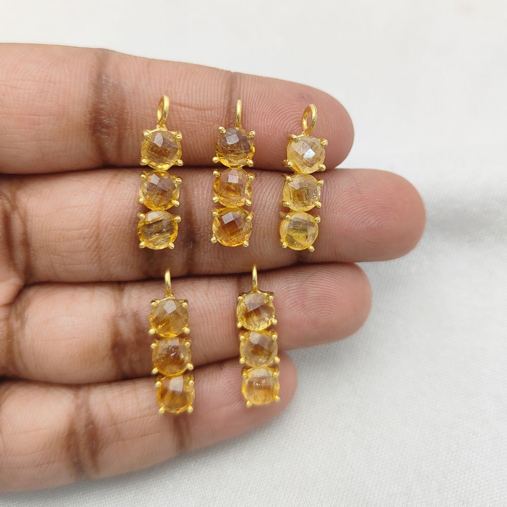 Gold plated citrine pendant with faceted round stones