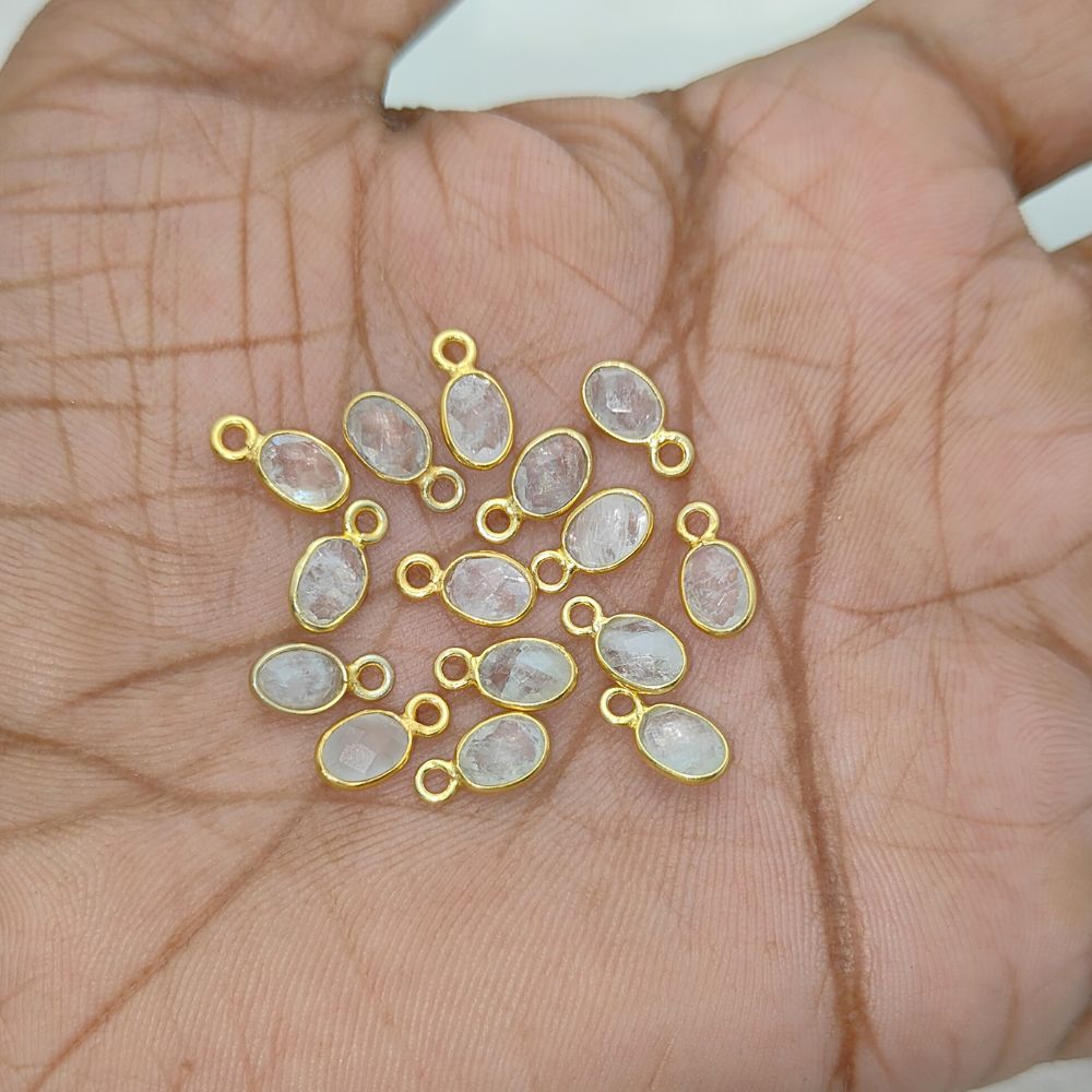 Dainty celestial necklace featuring a glowing rainbow moonstone