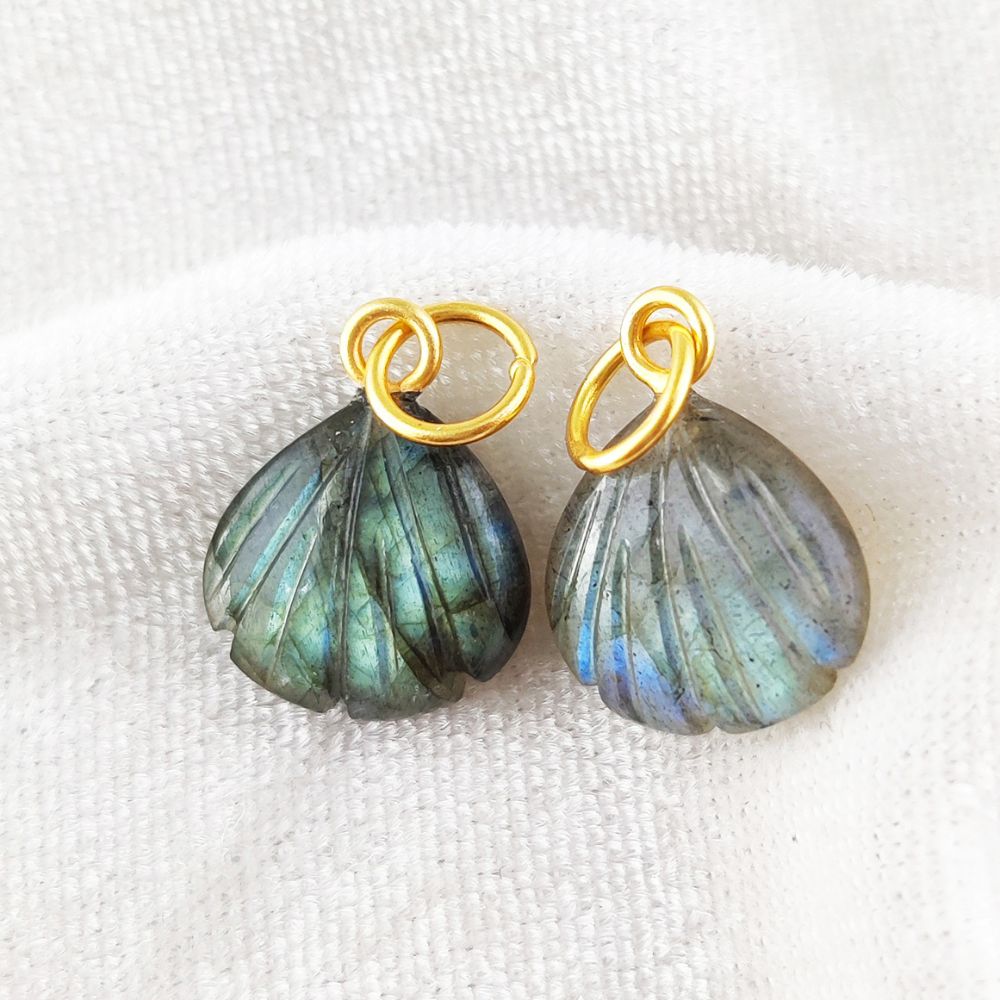 Handmade heart-shaped blue fire labradorite pendant in 18k gold-plated sterling silver, showcasing a stunning seashell design