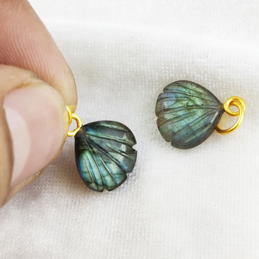 Exquisite heart-shaped seashell pendant featuring blue fire labradorite gemstone, crafted from 18k gold-plated sterling silver.