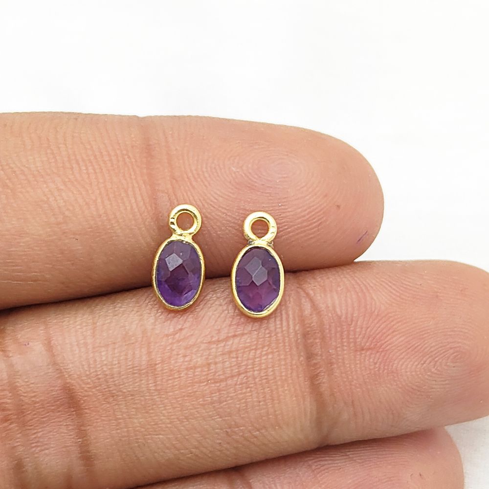 Delicate gold necklace with purple amethyst stone for February birthdays