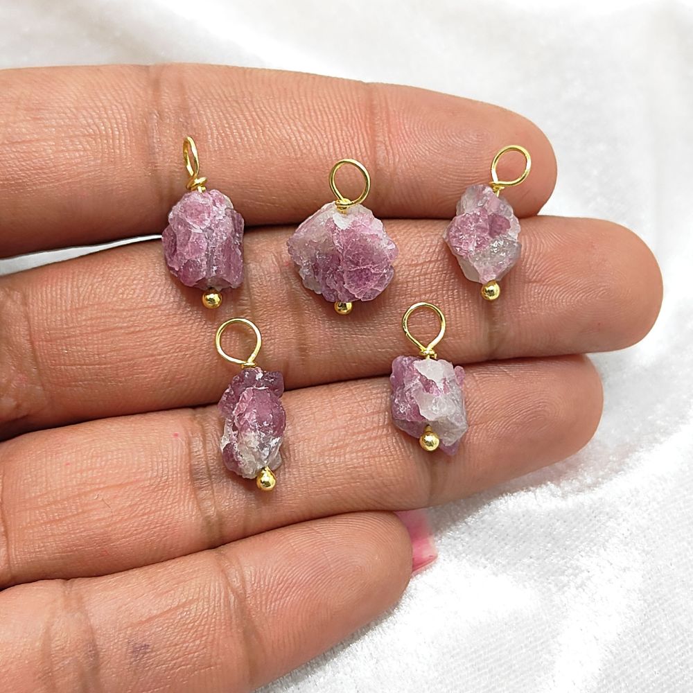 Wire-wrapped raw pink tourmaline crystal pendant – perfect for custom necklaces and DIY jewelry projects