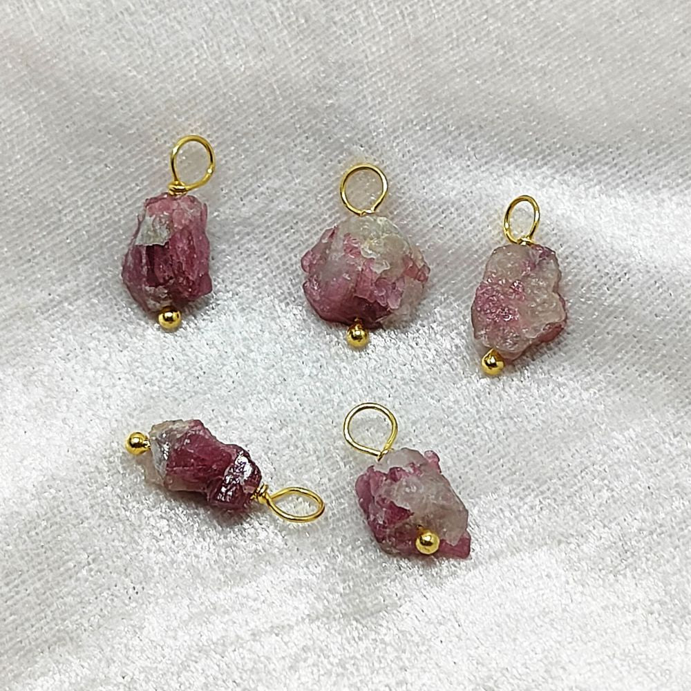 Natural pink tourmaline gemstone charm with an elegant wire wrap – a stunning addition to handmade jewelry collections