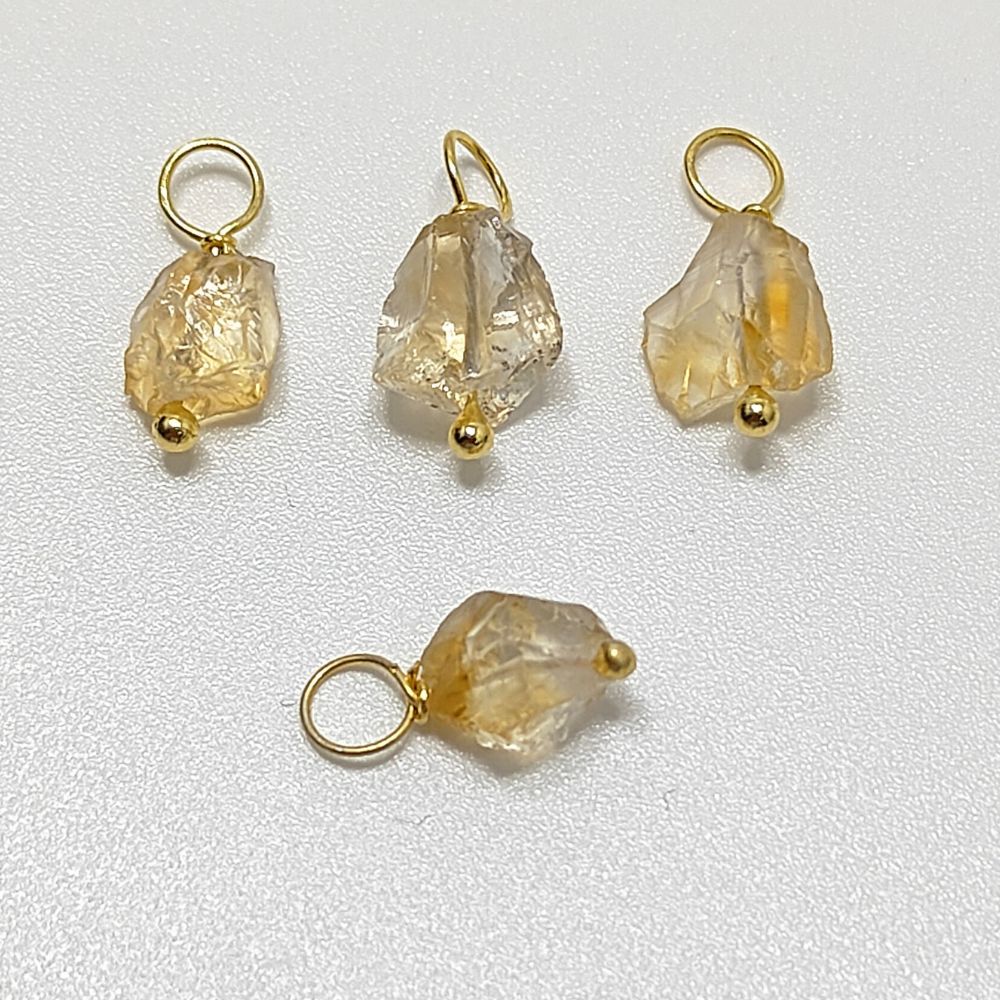 Raw yellow citrine pendant wrapped in gold-plated sterling silver – a perfect November birthstone charm