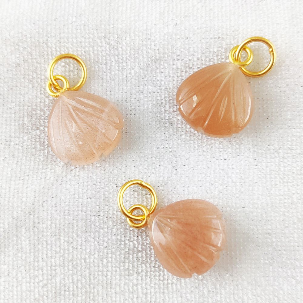 Gorgeous peach moonstone heart pendant in gold-plated silver, designed with a seashell motif for a feminine touch