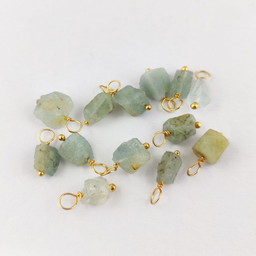 Elegant raw aquamarine crystal pendant wrapped in gold-plated sterling silver – perfect for DIY jewelry