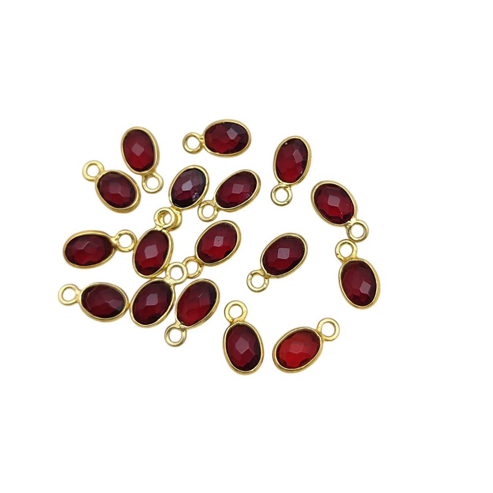 Red garnet charm necklace with elegant oval gemstone pendant