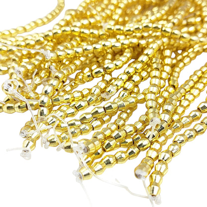 Antique gold brass drum spacer beads for vintage jewelry making