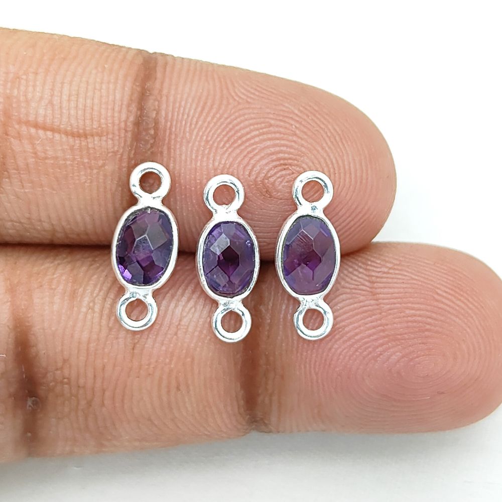 Oval purple amethyst connector charm in gold bezel