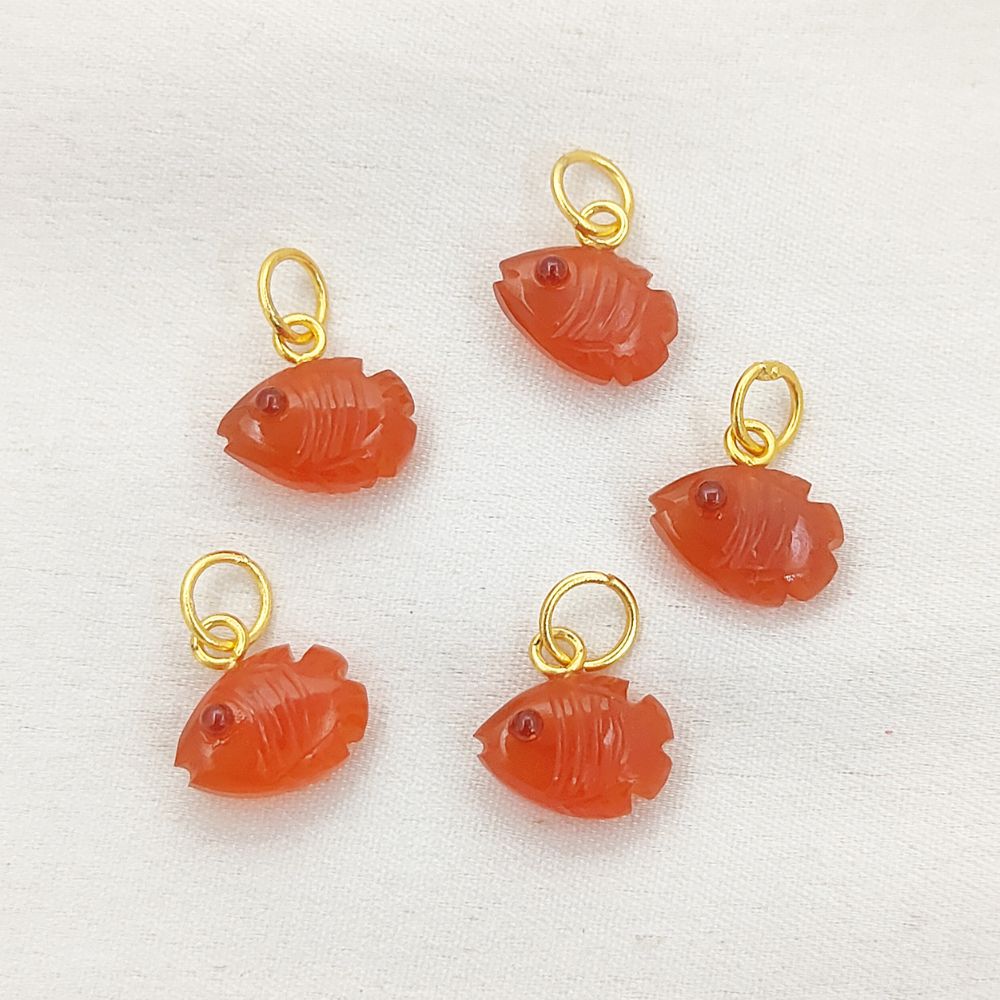 Close-Up of Natural Carnelian Fish Pendant with Gold Bail