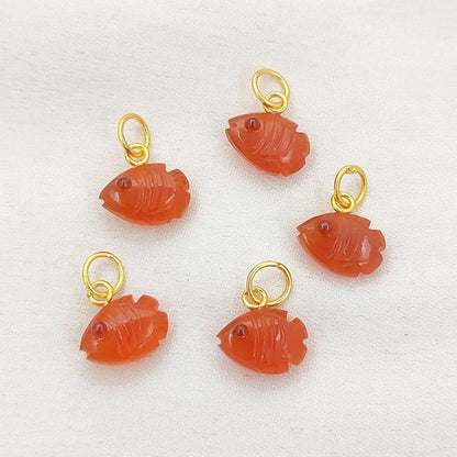 Close-Up of Natural Carnelian Fish Pendant with Gold Bail