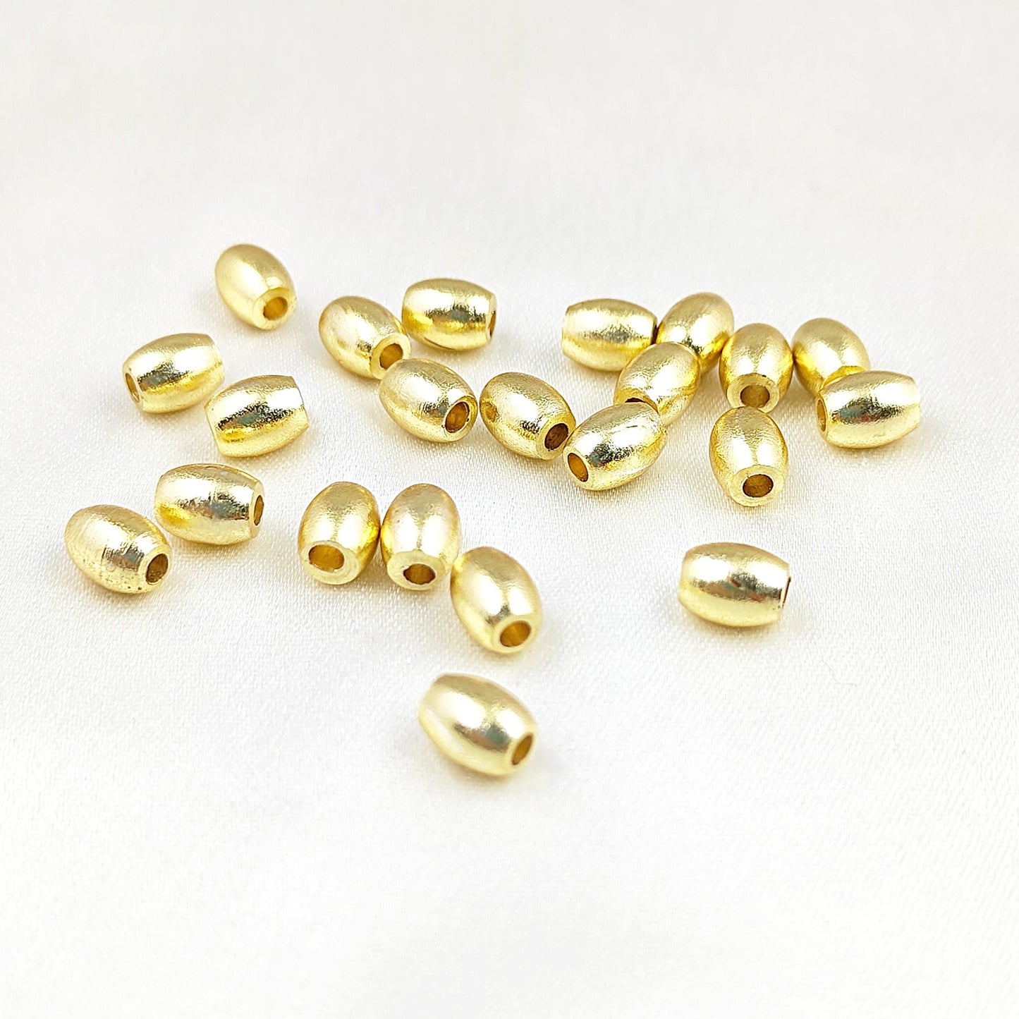 Oval-shaped gold plated spacer beads for bracelets and necklaces