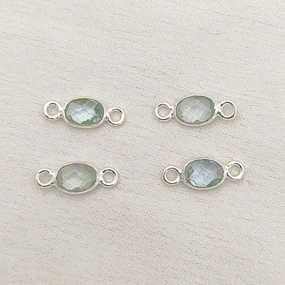 Oval aquamarine charm for necklaces, bracelets, or earrings