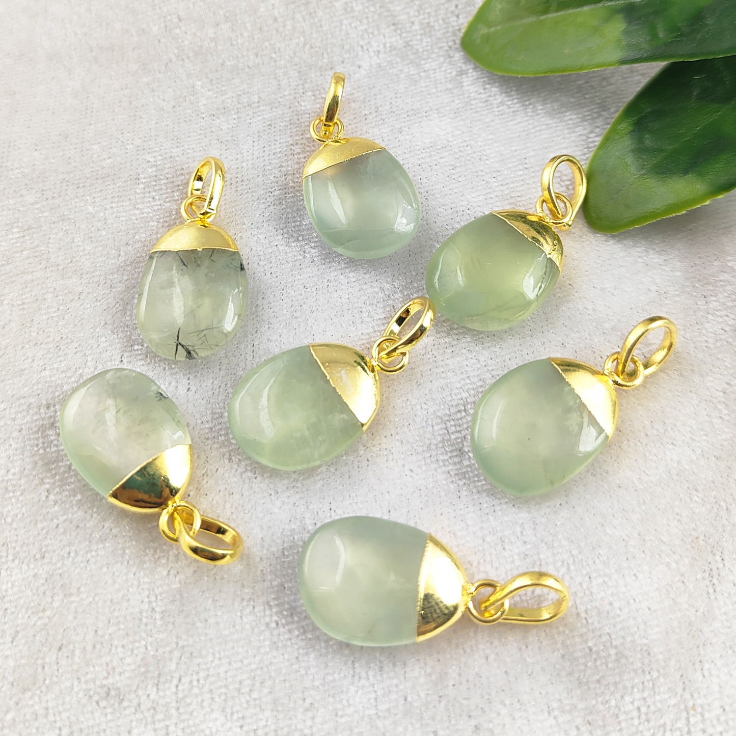 Each pendant features beautiful green prehnite, meticulously handcrafted for a unique and personal touch.