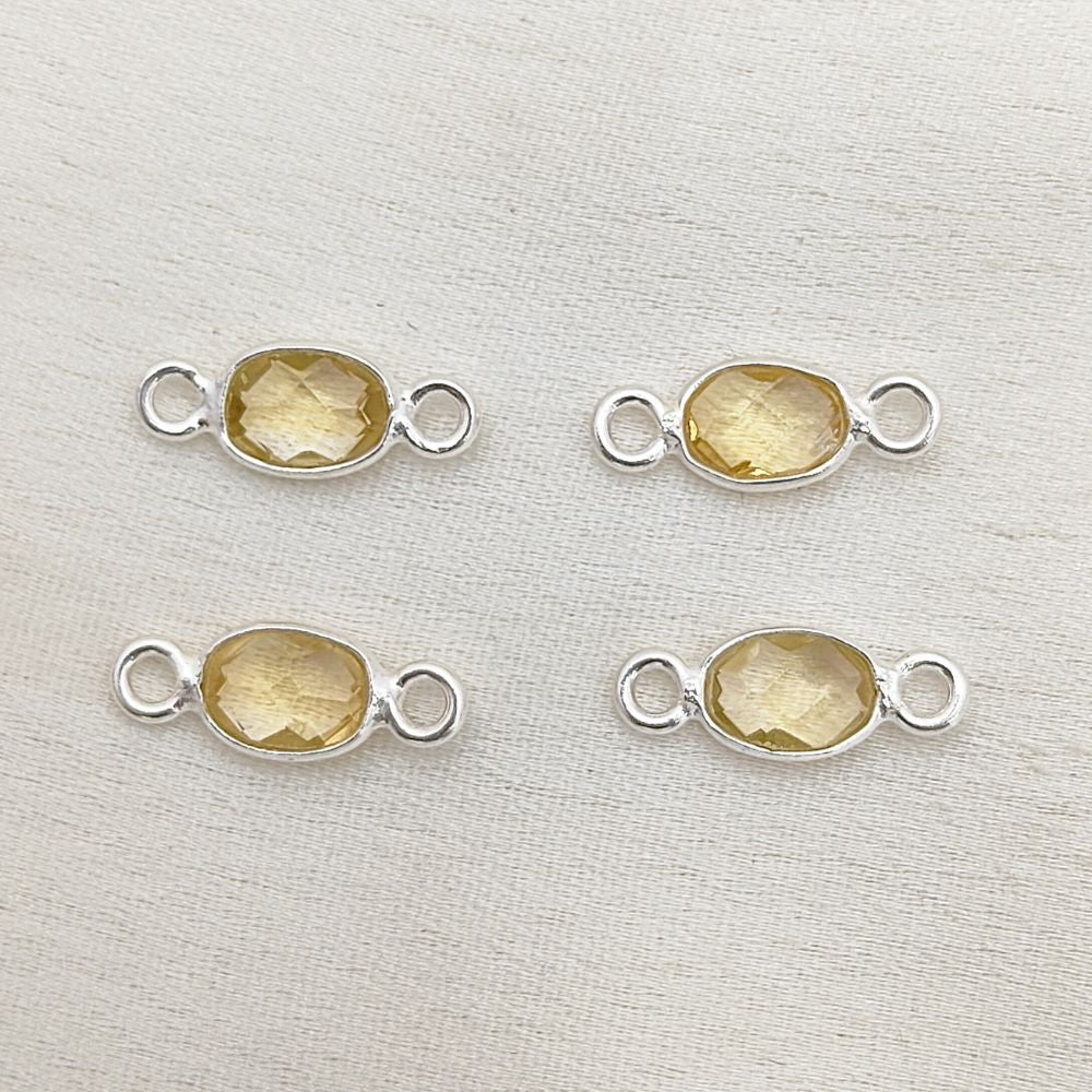 Bezel set citrine connector in silver setting