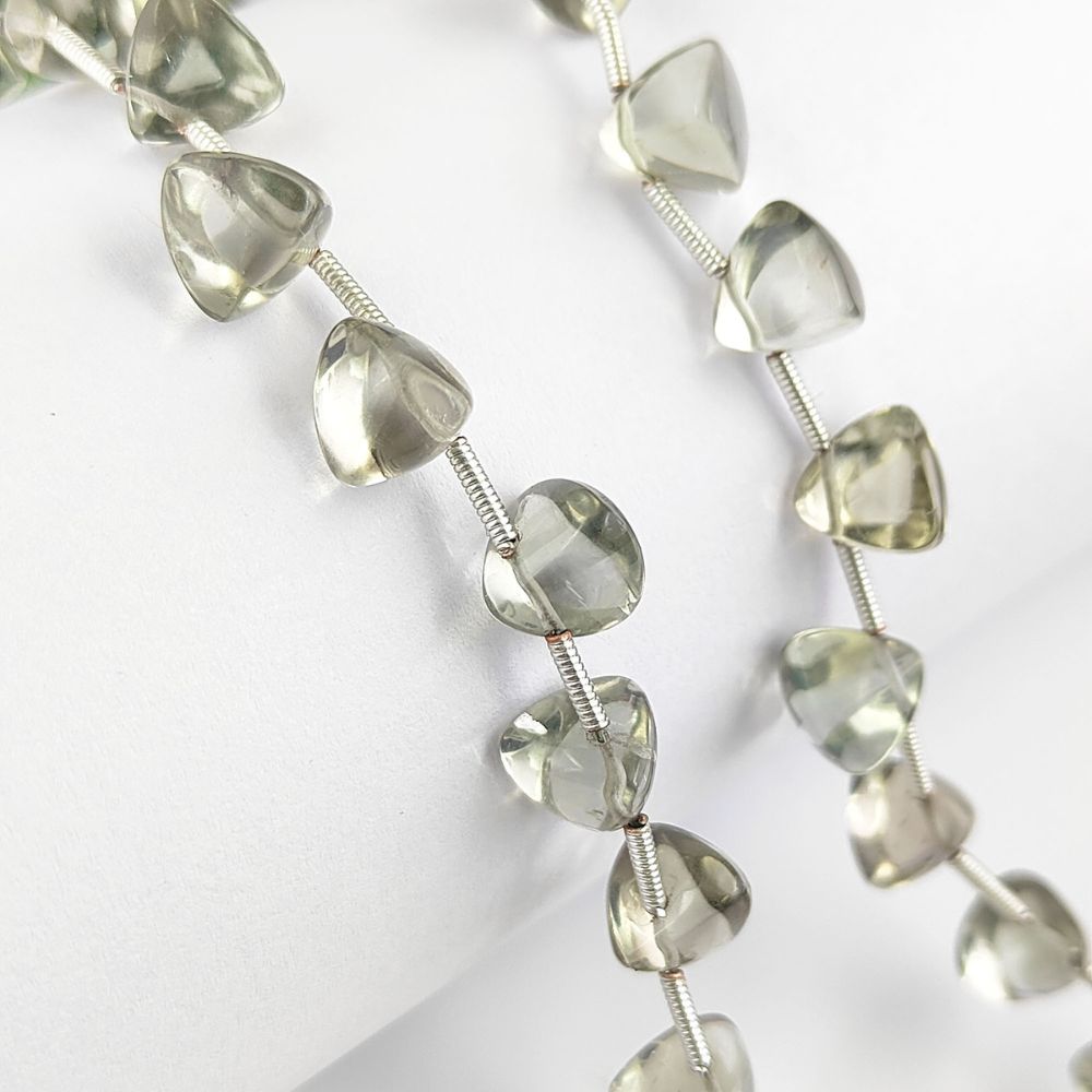 Natural green amethyst beads with soft glow for crafting