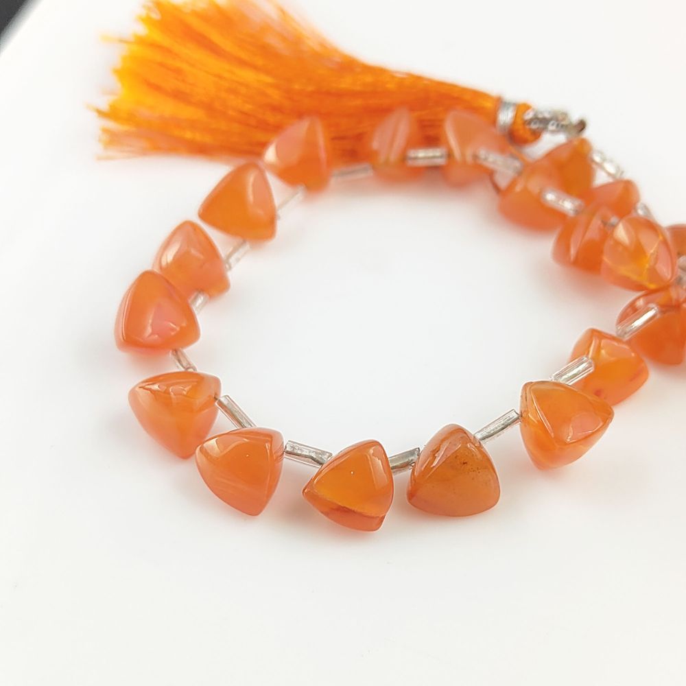 Natural orange carnelian briolette beads with top-drilled holes